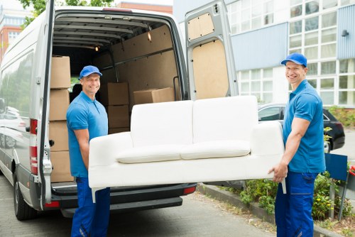 Careful furniture packing and loading for a White City home removal