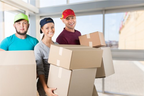 Packed boxes and furniture prepared for a White City removal