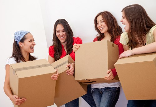 Moving team preparing a White City apartment relocation
