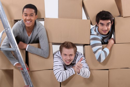 Office furniture and equipment being prepared for a White City move