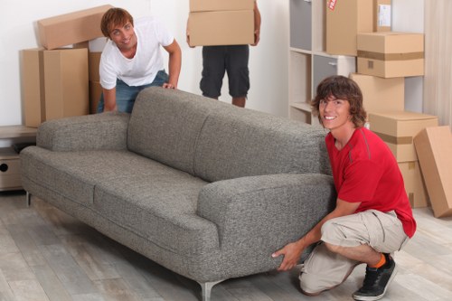 Local moving team loading furniture for a White City relocation