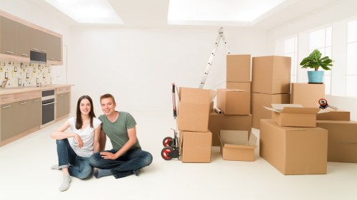 Packed boxes and furniture ready for house removal in West London