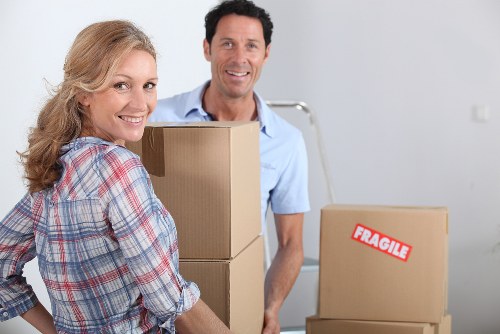 Man with van service helping with residential or office relocation in White City