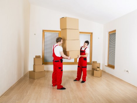 Loading furniture into a removal truck